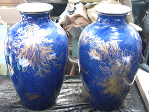 PAIR OF GILDED CRESCENT CHINA VASES
