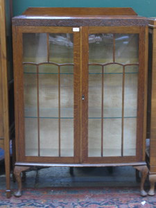 OAK BOW FRONTED, TWO DOOR GLAZED DISPLAY CABINET