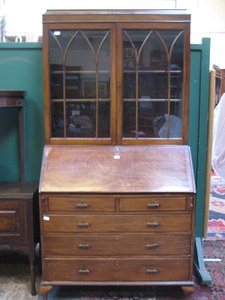 MAHOGANY FALL FRONT WRITING BUREAU, FITTED INTERIOR AND TWO DOOR GLAZED BOOKCASE TOP SECTION