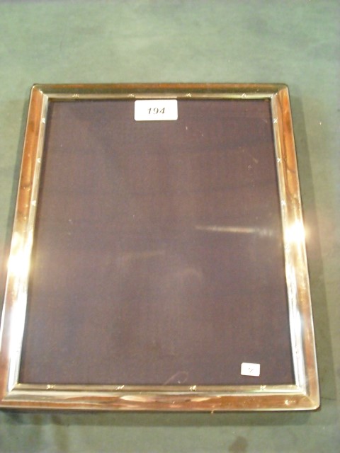 A silver mounted easel photograph frame of plain rectangular form, Sheffield 1997, 25.5 x 20.5cm (