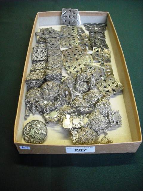 A suite of Indian filigree jewellery, together with two silver plated belts.