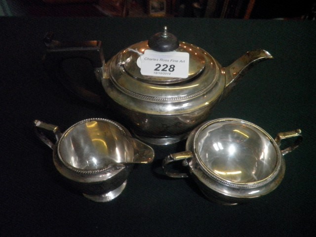 A silver three piece bachelors tea set, Birmingham 1924.