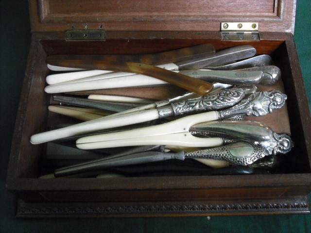 An oak inlaid and crossbanded glove box, containing a large collection of ivory, silver and ebony