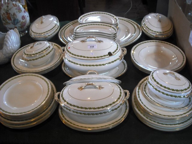 A George Jones & Sons, Crescent China part-dinner service, comfortably an eight place setting.