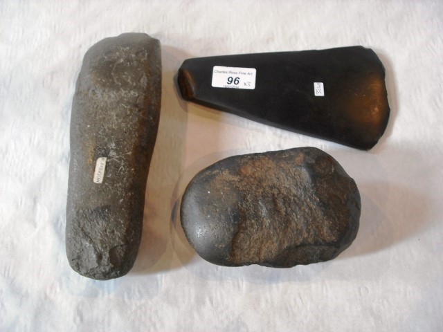 A Polynesian polished stone axe head, together with a south downs neo-lithic hammer and a Native