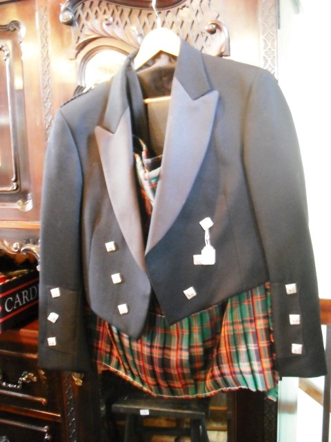 A mixed lot of Scottish National Dress, including a Cummings tartan kilt, together with jackets,