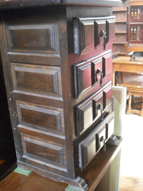 An imported hardwood bedroom chest, the rectangular top over four drawers, each with cast metal drop