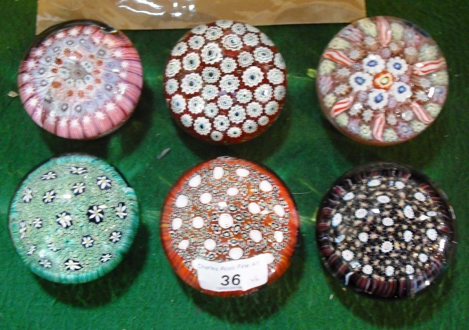 Six various cut cane included paperweights.