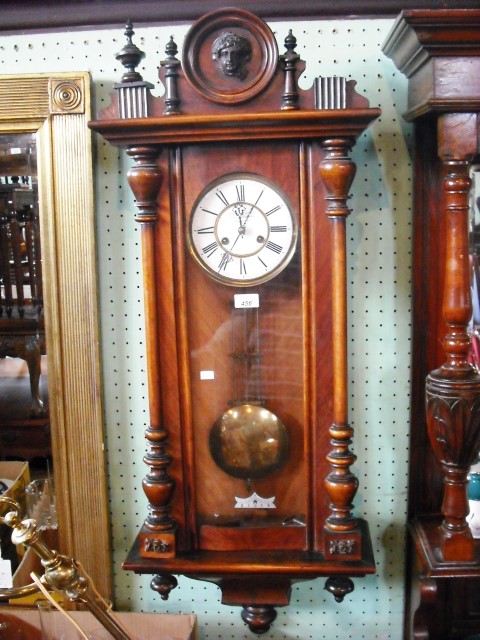 Goldberg & Bornstein & Co., London.  A late 19th century walnut cased Vienna wall clock, having a