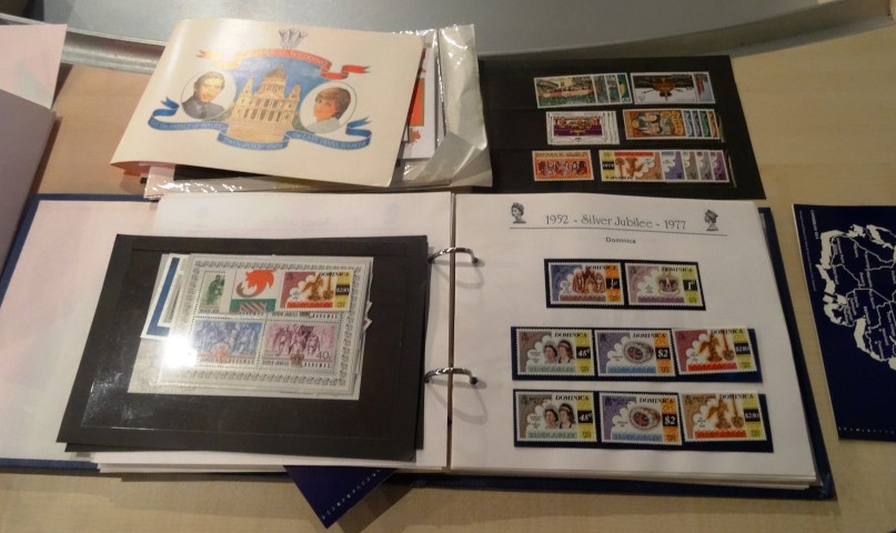 The Silver Jubilee Stamps of Queen Elizabeth II, contained within an album, together with a small