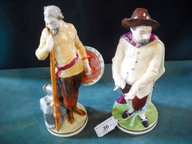 A Crown Derby porcelain figure of a bearded knight with jousting pole, standing beside his armour,