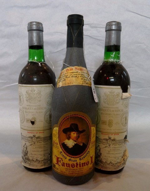 1 bottle - Faustino Rioja Gran Reserva 1994.
1 bottle - Marquis de Riscal Rioja 1971 (all bottom