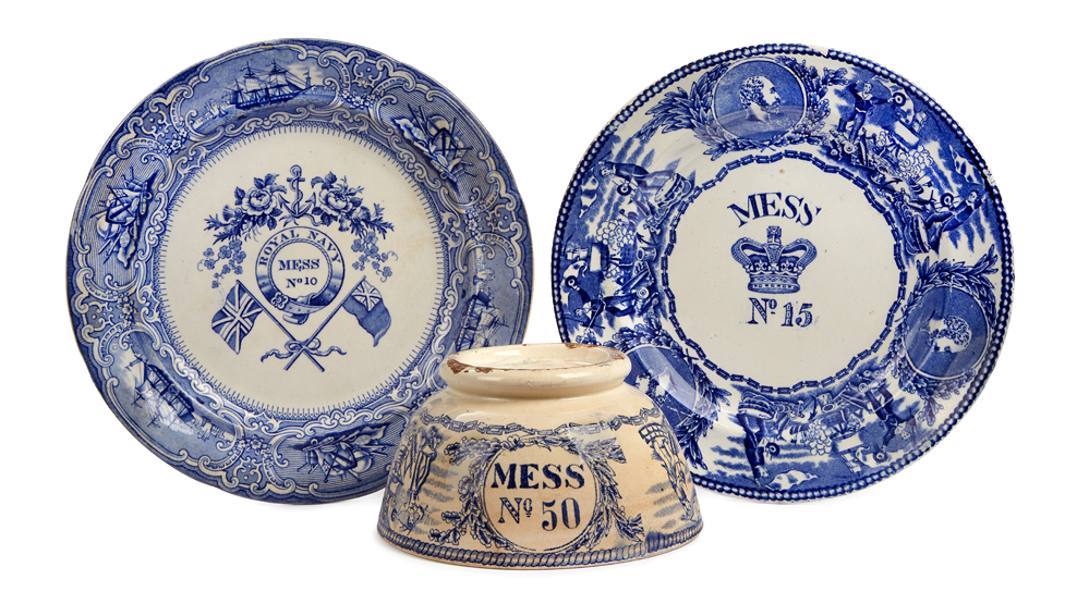 THREE ITEMS OF BOVEY TRACEY BLUE AND WHITE MESS WARE, comprising a rare Edwardian example numbered