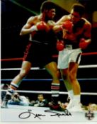 Leon Spinks signed colour 10x 8 action photo. Good condition
