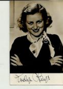 Evelyn Laye signed sepia photo. Good condition.