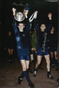 Pat Crerand signed colour 12x8 photo. Signed in silver, photo taken after winning the European Cup