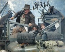 Karen Allen signed stunning 10 x 8 action photo with Harrison Ford in Raiders of the Lost Ark Good