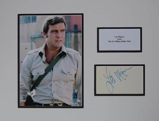 Lee Majors 17x13 double mount with a signed card by Lee, plaque and a photo. Good Condition
