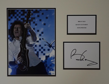 Brian May 17x13 double mount with a photo of Brian, plaque and a signed card by Brian Good Condition