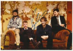 Ben Lovett. Colour 8x12 photograph of the popular folk band Mumford and Sons, autographed by Ben