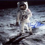 Buzz Aldrin signed photo. Gemini and Apollo astronaut Buzz Aldrin is shown here standing on the