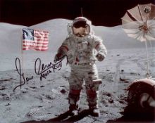 Gene Cernan signed photo. This 8? x 10? print depicts Apollo 17 Commander Gene Cernan, the last man