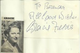 Gracie Fields signature piece fixed to Autograph album page with small inset b/w photo.
