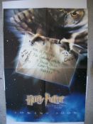 Harry Potter stars James and Oliver Phelps signed large colour poster for Philosophers Stone. To