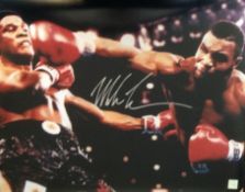 Mike Tyson boxing champion Signed 24 X 16 Online Authentics photo. Good condition
