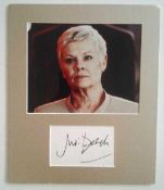 Judi Dench signature piece matted underneath a lovely colour 8x10 photo of her as M in the recent