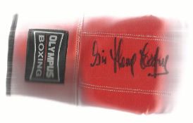 Sir Henry Cooper signed Olympus Red Boxing Glove. Lightweight training glove. Good condition