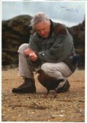 David Attenborough signed 12 x 8 colour photo with small bird. Good condition