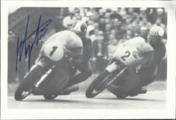 Giacomo Agostini  signed 8 x 6 b/w motor cycle racing photo. He is an Italian multi-time world