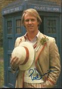 Peter Davison as Dr Who signed 6 x 4 colour portrait photo outside Tardis. Good condition
