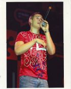 Lee Ryan signed 10 x 8 colour photo of the singer from Blue on stage. Good condition