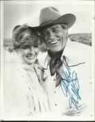 Howard Keel signed 10 x 8 b/w photo in ten gallon hat from Dallas. Good condition