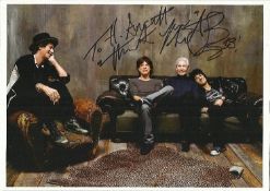 Charlie Watts signed 12 x 8 Rolling Stones group photo dedicated. Good condition