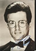 Sylvester Stallone signed 12  8 b/w photo in DJ. Good condition