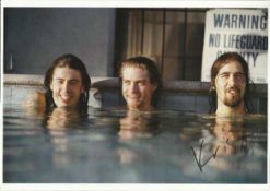 Krist Novoselic signed stunning 12 x 8 colour of Nirvana members in a swimming pool up to their