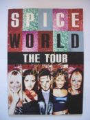 Spice Girls signed to front of Spice World the Tour. Signed by Geri & Emma Good condition