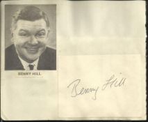 Benny Hill signature piece fixed to Autograph album page with small inset b/w photo. signed on