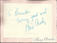 Bing Crosby signature piece fixed to Autograph album page.