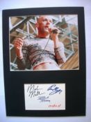 REM signed and mounted presentation with colour photo and card signed by all four band members;