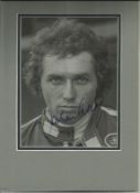 Motor racing collection consisting of signed mounted photos and 2 other signature pieces. Good