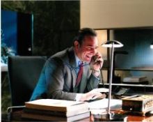 Jean Dujardin 10x8 c photo of Jean from the Wolf of Wall Street, signed by him at the Monuments