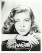 Lauren Bacall signed 10 x 8 black and white portrait photo. Good condition