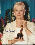 Dame Judi Dench signed 10 x 8 colour photo after receiving her Oscar. Good condition