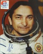 Valery Bykovsky signed 10 x 8 colour space suit photo. Soviet cosmonaut who flew three manned space