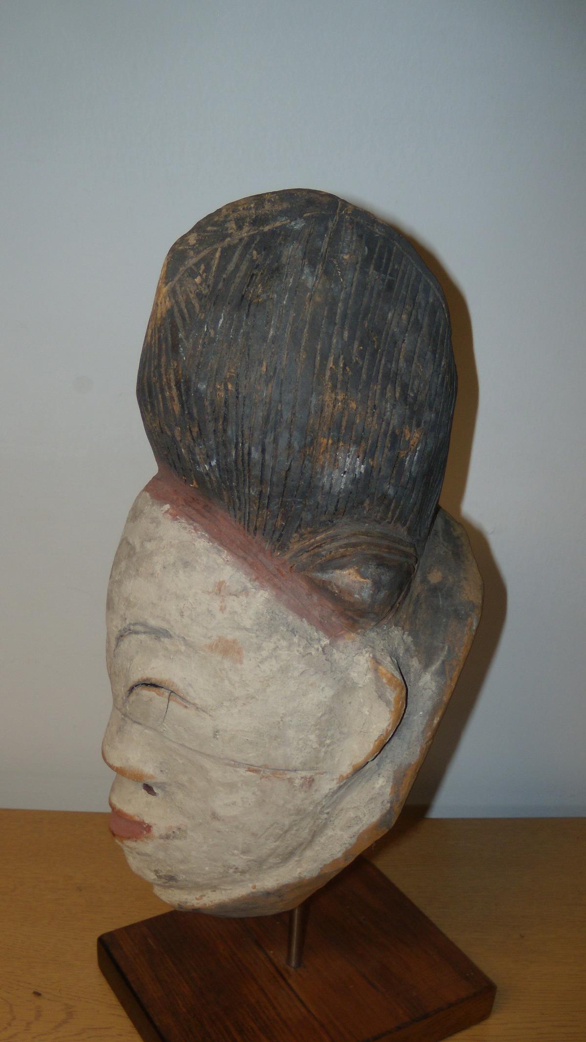 An early 20th century Punu Gabon wooden mask for a stilt dance, modelled as the head of a dead - Image 2 of 3