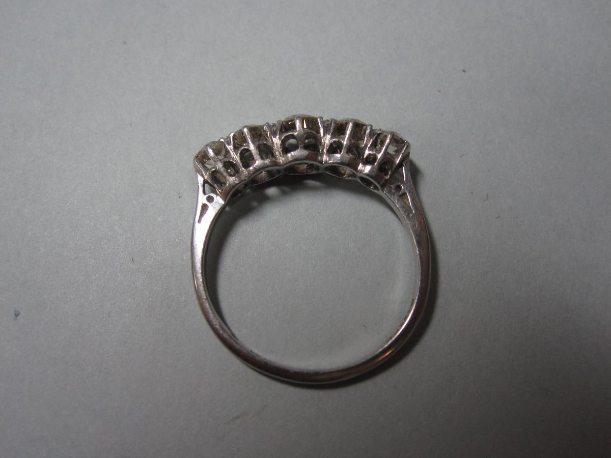 An old cut diamond five stone ring, the graduated approximately round old cut diamonds claw set to - Image 2 of 4